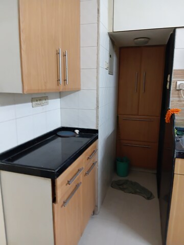 Kitchen in 3 BHK Apartment at Neelam CHS Dadar, Dadar East – for Rent