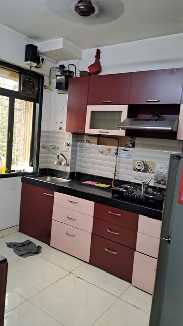 Kitchen in 2 BHK Apartment at Jasmine Tower, Vasant Vihar – for Rent