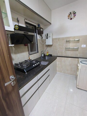 Kitchen in 3 BHK Apartment at Adani Group Western Heights, Andheri West – for Rent