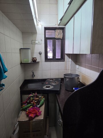 Kitchen in 1.5 BHK Apartment at Sahar CHS, Andheri East – for Rent