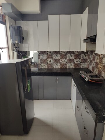 Kitchen in 2 BHK Apartment at Shree Vardhman Green Court, Sector 90 – for Rent