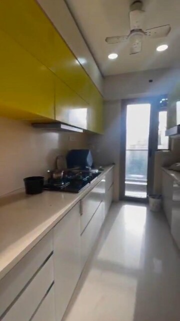 Kitchen in 3 BHK Apartment at Adani Western Heights Sky Apartments, Andheri West – for Rent