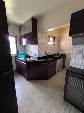Kitchen in 3 BHK Apartment at Eden Garden CHS, Viman Nagar – for Rent