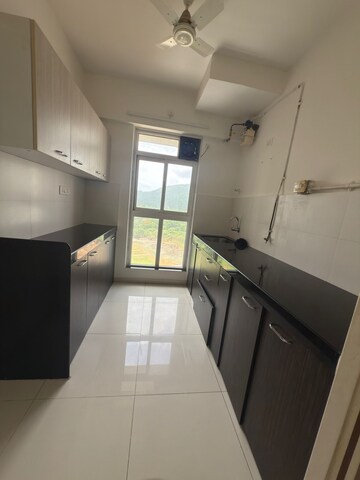 Kitchen in 2 BHK Apartment at Godrej Emerald, Ghodbunder Road – for Rent