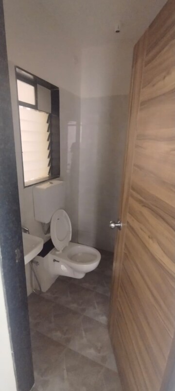 Bathroom in 1 BHK Apartment at KM Horizon Exotica, Haware City – for Rent