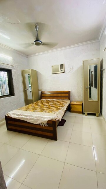 Living Room in 1 BHK Apartment at Vile Parle West – for Rent