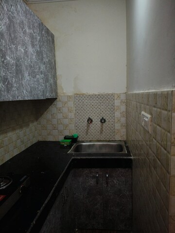 Kitchen in 2 BHK Builder Floor at Dayanand Colony – for Rent