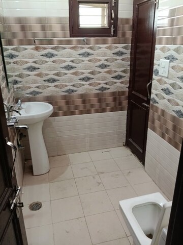 Bathroom in 3 BHK Apartment at Khanpur – for Sale