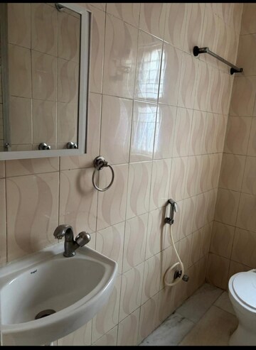 Bathroom in 3 BHK Apartment at Seven Bungalow, Andheri West – for Rent