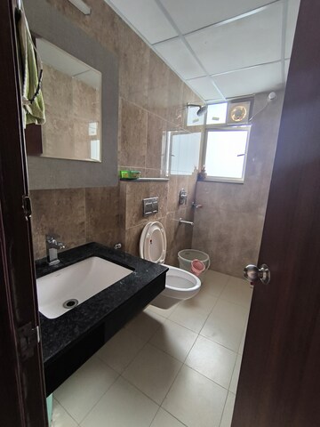 Bathroom in 3 BHK Apartment at Shapoorji Pallonji Joyville Phase 2, Sector 102 – for Rent