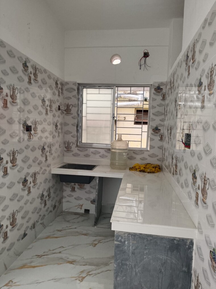 Kitchen, kona expressway 2 Bedroom 820 Sq.Ft. Apartment In Kona Expressway Kolkata 9001701