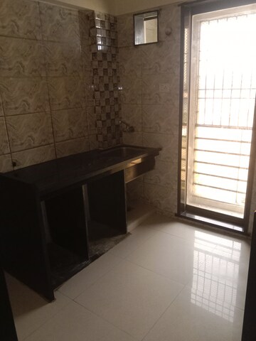 Bathroom in 1 BHK Apartment at Ritu Gardenia, Naigaon East – for Rent