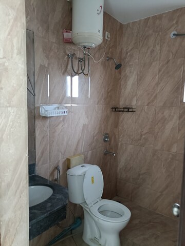 Bathroom in 4 BHK Builder Floor at Ansal API Esencia, Sector 67 – for Rent