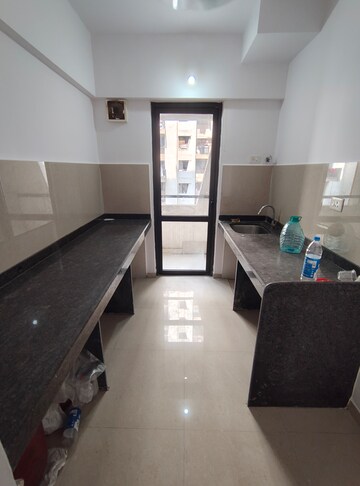 Kitchen in 1 BHK Apartment at Lodha Palava City Lakeshore Greens, Dombivli East – for Rent