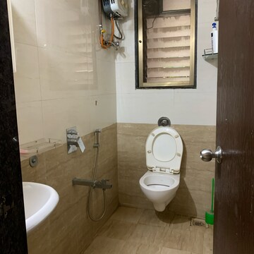 Bathroom in 2 BHK Apartment at VAS Pushp Vinod 15, Vivekanand Nagar – for Rent