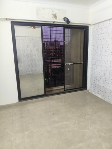 Room in 2 BHK Apartment at Triveni Flora, Khadakpada – for Sale
