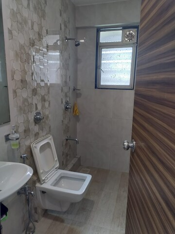 Bathroom in 2 BHK Apartment at Laxmi Vihar Khar, Khar West – for Rent