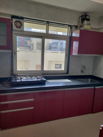 Kitchen in 2 BHK Apartment at Laxmi Vihar Khar, Khar West – for Rent