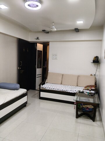 Living Room in 2 BHK Apartment at Sneh CHS Santacruz, Santacruz West – for Sale