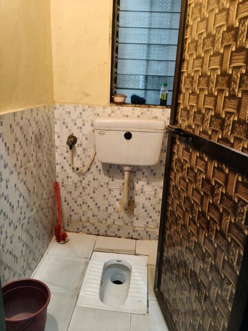 Bathroom in 1 BHK Apartment at Anjali Kiran CHS, Santacruz East – for Rent