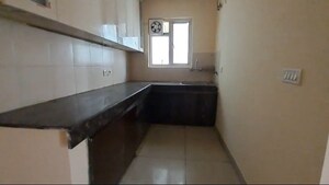 Kitchen in 2 BHK Apartment at Panchsheel Greens, Sector 16 Greater Noida – for Sale