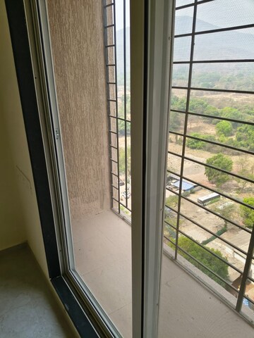 Building Lobby in 1 BHK Apartment at Mahavir Kalpavruksha, Ghodbunder Road – for Rent