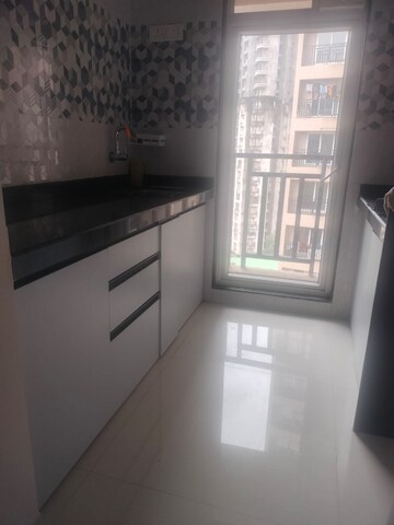 Kitchen in 1.5 BHK Apartment at Rosa Gardenia, Ghodbunder Road – for Rent