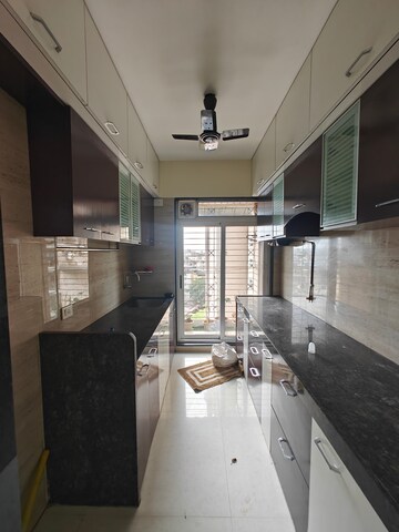 Kitchen in 2 BHK Apartment at Tricity Panache, Sanpada – for Rent