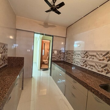 Kitchen in 2.5 BHK Apartment at  Satyam Extica, Ulwe Sector 18 – for Sale