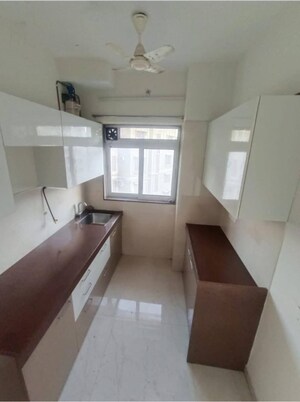 Kitchen in 1 BHK Apartment at MK Gabino, Andheri West – for Sale
