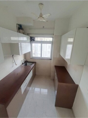 Kitchen in 1 BHK Apartment at MK Gabino, Andheri West – for Sale