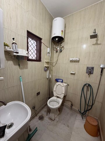 Bathroom in 1 BHK Apartment at Mayur Bagh Apartments, Paschim Vihar – for Rent