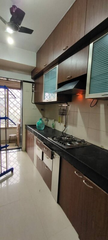 Kitchen in 2 BHK Apartment at Swapnalok Towers, Malad East – for Rent
