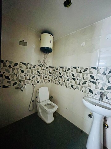 Bathroom in 3 BHK Builder Floor at Chattarpur – for Rent