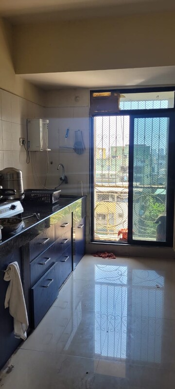 Kitchen in 2 BHK Apartment at Ghansoli Sector 29c – for Rent