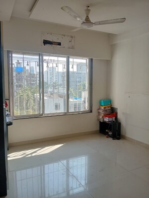 Room in 3 BHK Apartment at Om Malaygiri CHS, Borivali East – for Sale