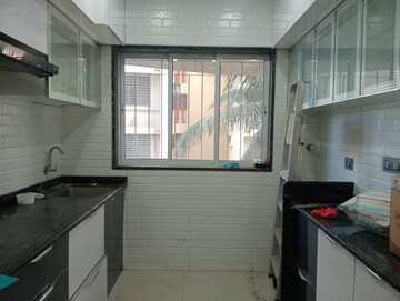 Kitchen in 3 BHK Apartment at Om Malaygiri CHS, Borivali East – for Sale
