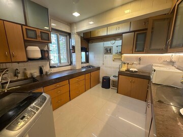 Kitchen in 4 BHK Apartment at Dn Nagar – for Rent