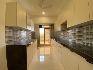 Kitchen in 4 BHK Apartment at Usha Kiran CHS Andheri, Andheri West – for Rent