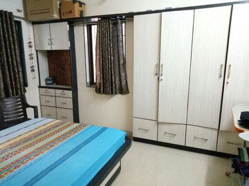 Bedroom in 3 BHK Apartment at Vyas Anudatta CHS, Rambaug Colony – for Sale