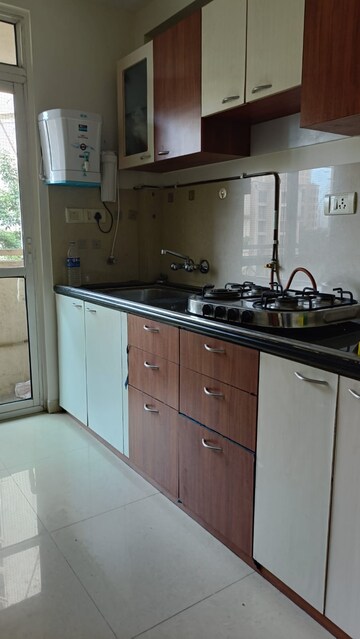 Kitchen in 1 BHK Apartment at Hiranandani Estate, Ghodbunder Road – for Rent