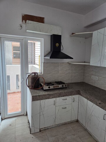 Kitchen in 3 BHK Apartment at Ajnara Ambrosia, Sector 118 – for Rent
