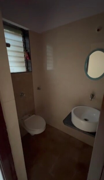 Bathroom in 1 BHK Apartment at Sudarshan Sky Garden, Ghodbunder Road – for Rent