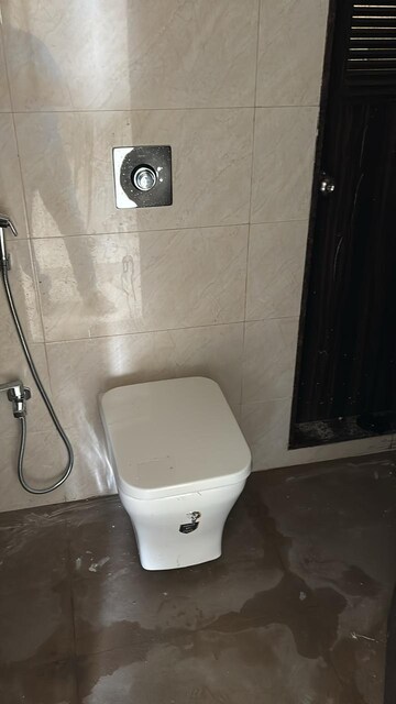 Bathroom in 2 BHK Apartment at Shree Tirupati STG Signature Residency, Patlipada – for Rent