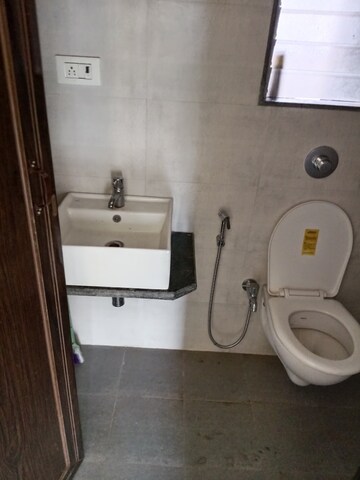Bathroom in 1 BHK Apartment at Vihang Valley Phase 3, Kasarvadavali – for Sale