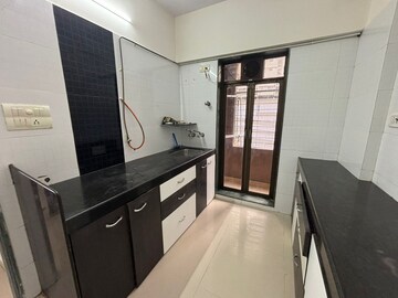 Kitchen in 2 BHK Apartment at Kandivali East – for Rent