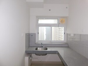 Kitchen in 1.5 BHK Apartment at Shapoorji Pallonji Sarova, Kandivali East – for Sale