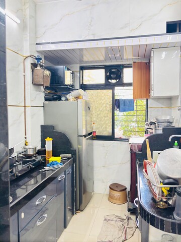 Kitchen in 1 BHK Apartment at Geetai CHS, Kharghar Sector 21 – for Rent