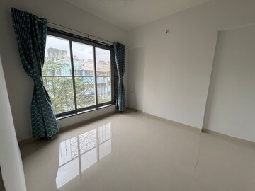 Room in 2 BHK Apartment at Shivam Mrinal CHS, Kandivali East – for Rent