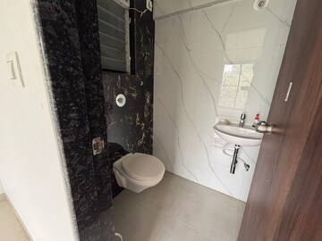 Bathroom in 2 BHK Apartment at Shivam Mrinal CHS, Kandivali East – for Rent